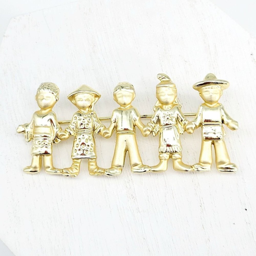 AJC American Jewelry Co. Children Of The World Brooch Satin & Polished Gold Tone